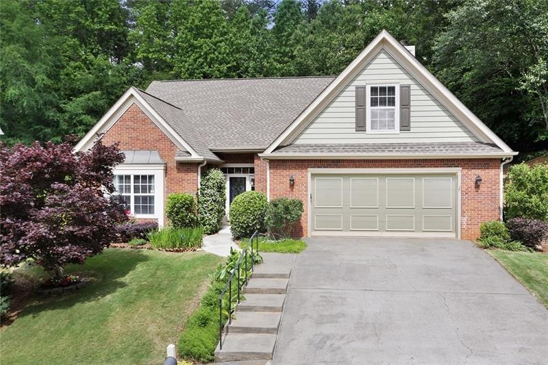 Master on main in this cute brick and siding house