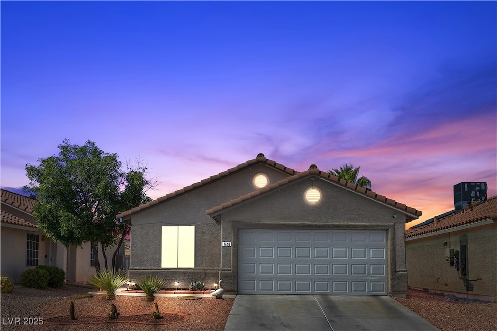Ranch-style home with a tiled roof, central air co
