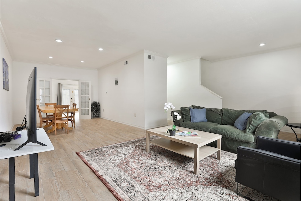 Family room overlooks the dining/sitting room. The