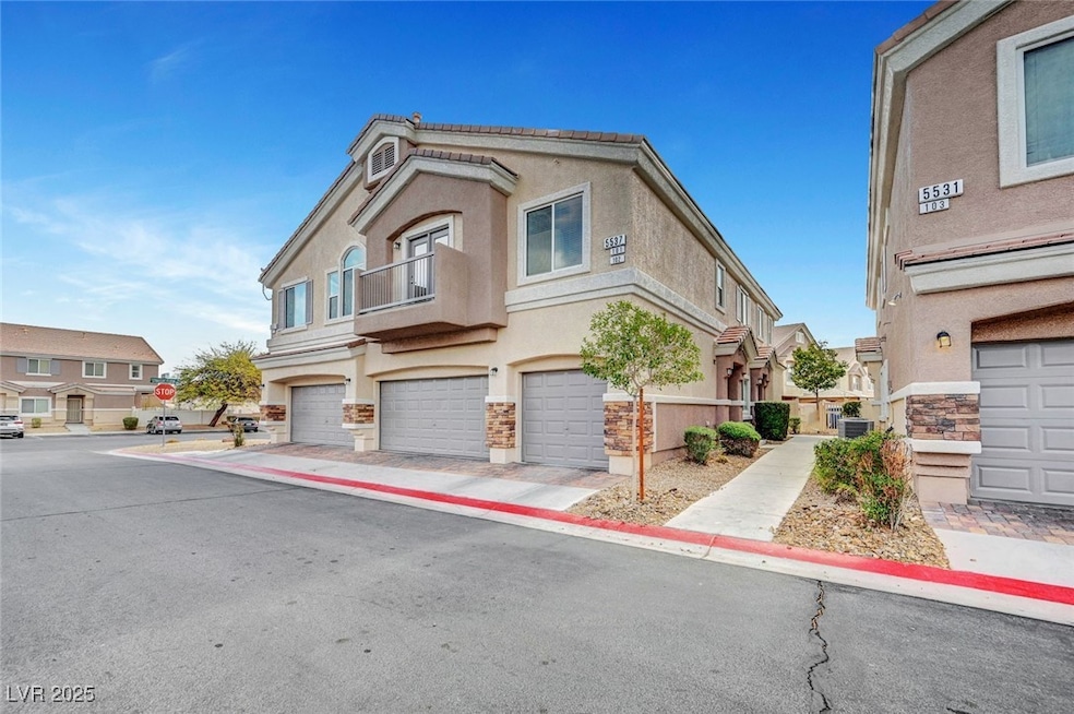 View of front of property with a garage, central A