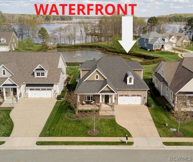 WATERFRONT! Overlooking two bodies of water!