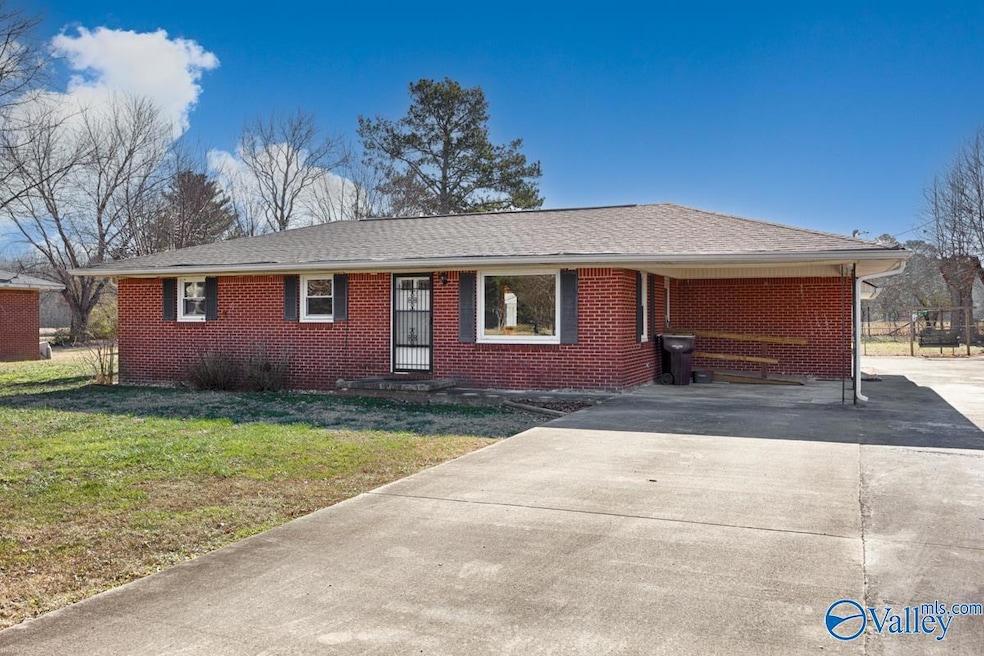 Brick house, Attached carport, concrete drieway