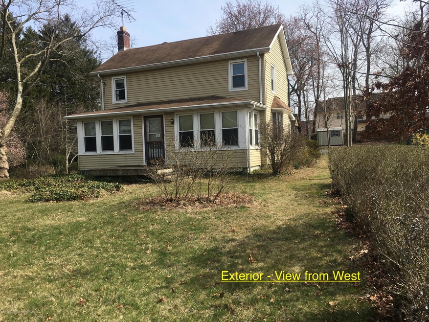 111 Tennent Rd, Morganville, NJ 07751 - photo 1