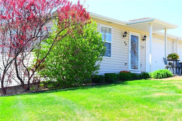 Welcome home!  Beautifully landscaped yard on a co