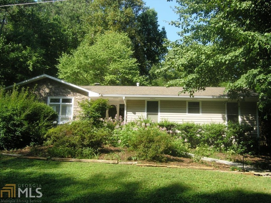 Nicely landscaped front entrance to updated home o