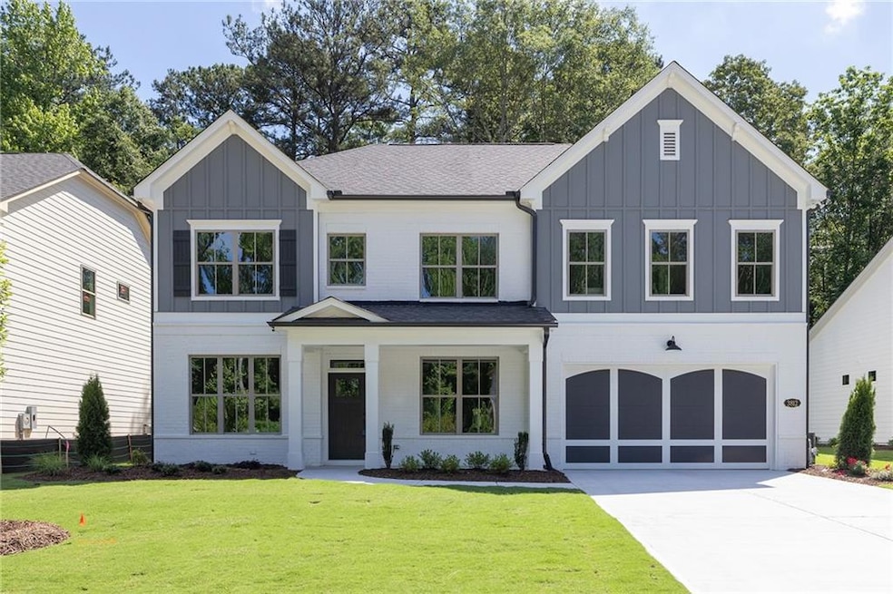 Modern farmhouse style home with a garage and a fr