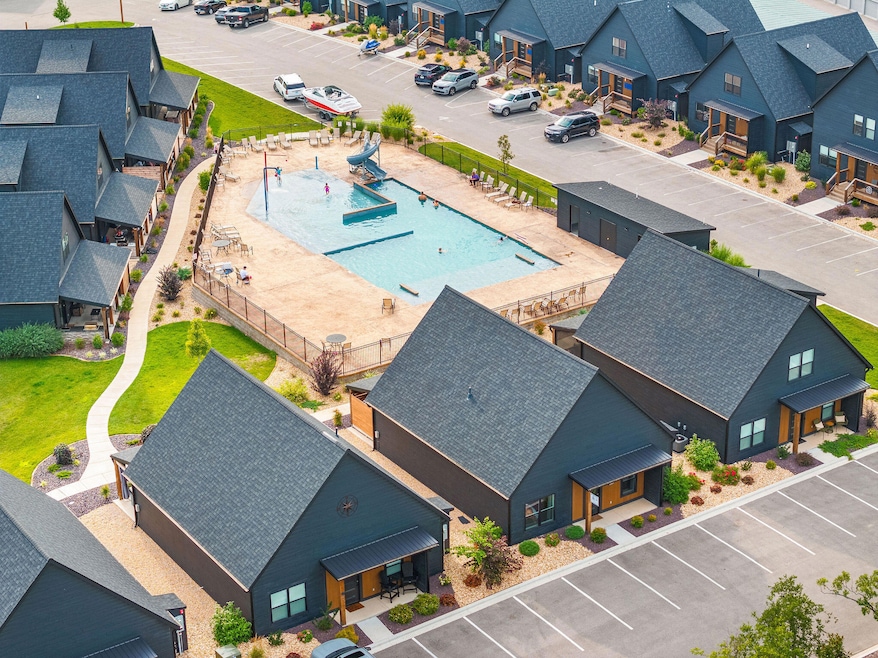 Outdoor Pool steps away from Unit
