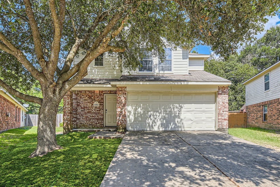 11811 Belle Ct, Pinehurst, TX 77362 - photo 1