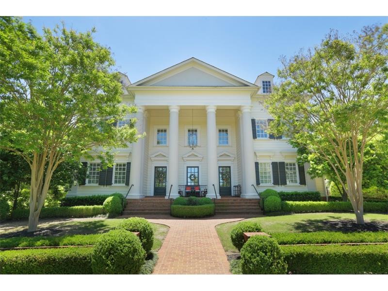 Beautiful Classical Home with rocking chair front 
