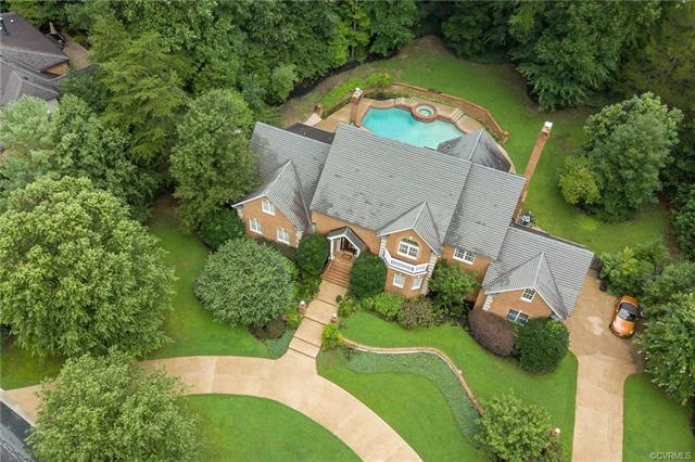 Situated on a private 1 acre lot with mature lands
