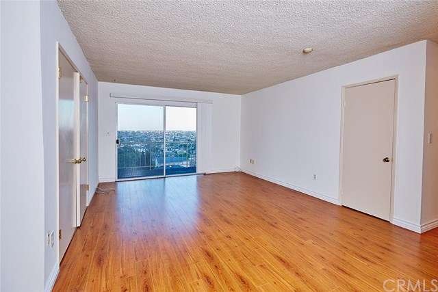 Living room and City Lights view from condo! 