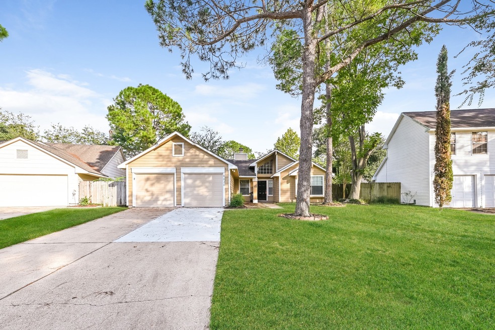 8626 Spruce Mill Dr, Houston, TX 77095 - photo 1
