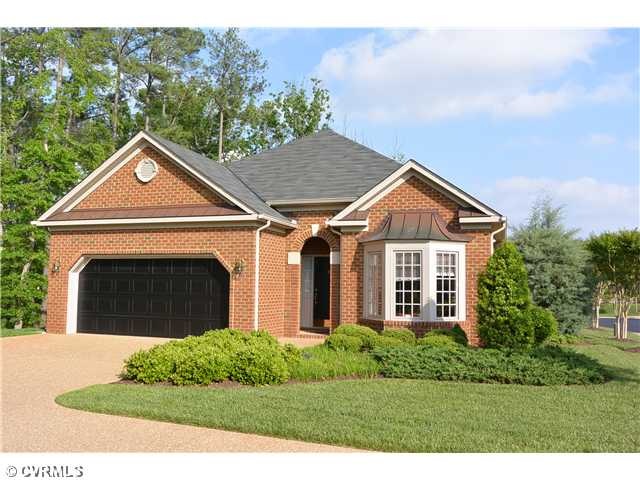 Exterior Front - All brick with aggregate walkway 