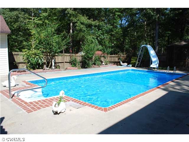 Pool - Gorgeous pool with pool house, slide, and s