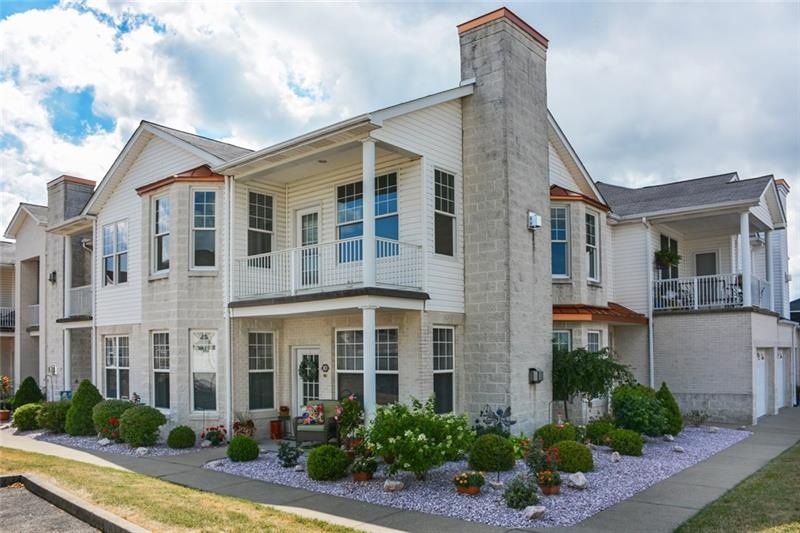 All plantings surrounding this corner unit have be