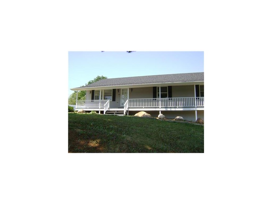 Front Exterior. LARGE COVERED PORCH - New Roof