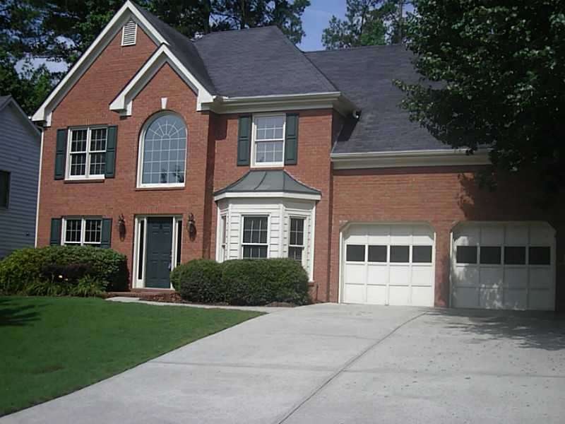 Exterior Front. Traditional 4 bedroom home with 2-