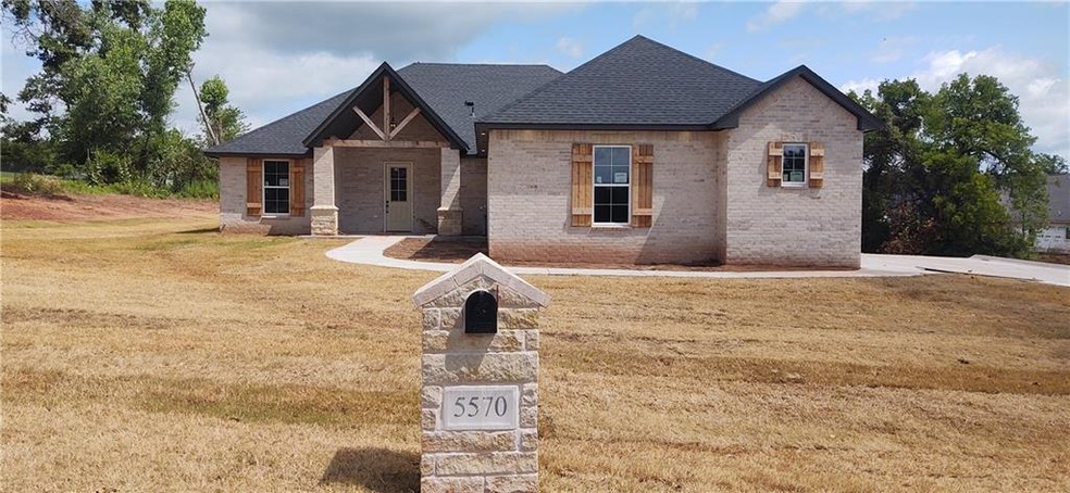 5570 LITTLE TRAIL FRONT ELEVATION