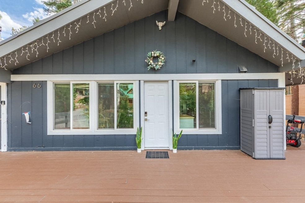 Front of house featuring a deck