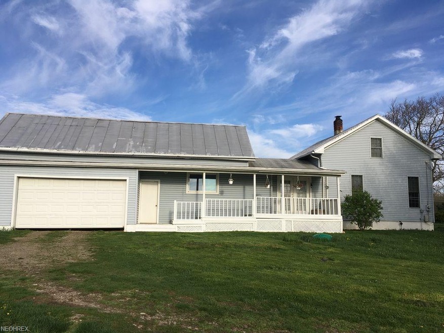 Front of the house and main driveway
