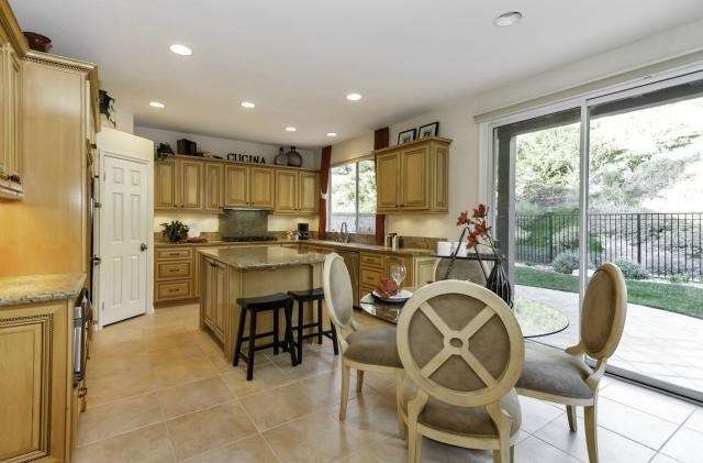 Generous kitchen with wonderful details has room f