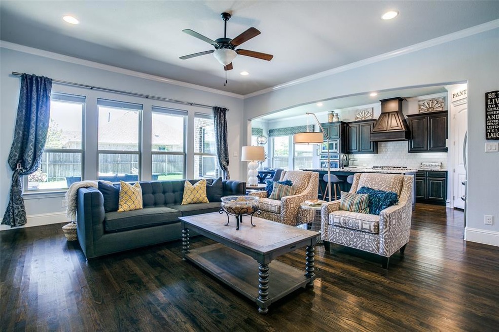 Large living space with a wall of windows.