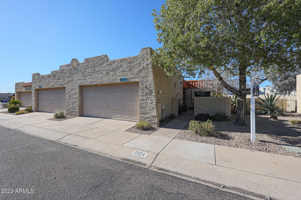 RARE GATED PATIO HOME W/2 CAR GARAGE
