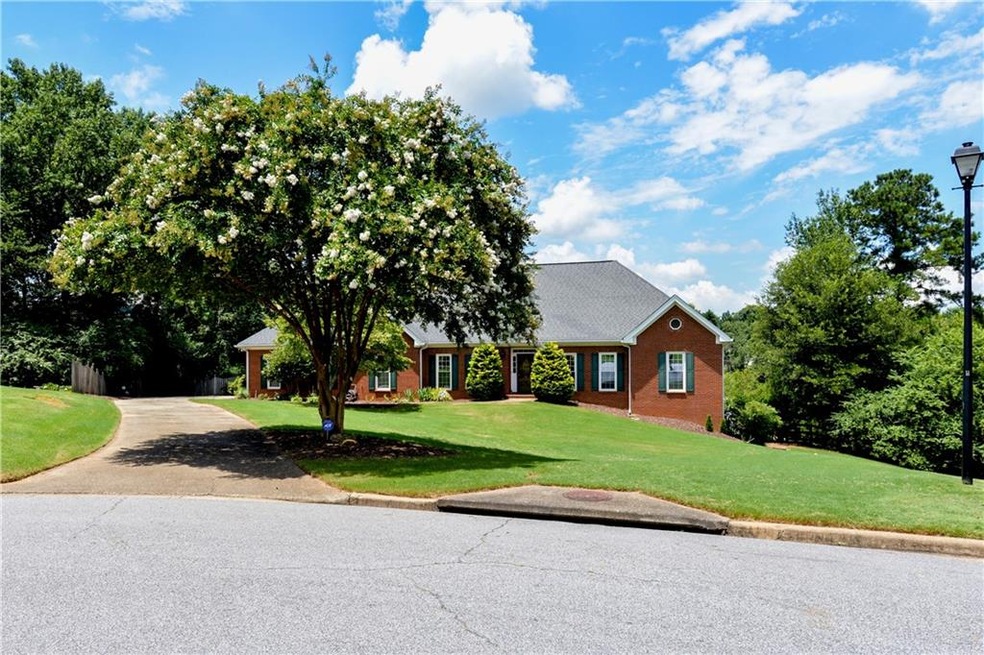 BEAUTIFUL BRICK RANCH WITH FIVE BEDROOMS PLUS A SW