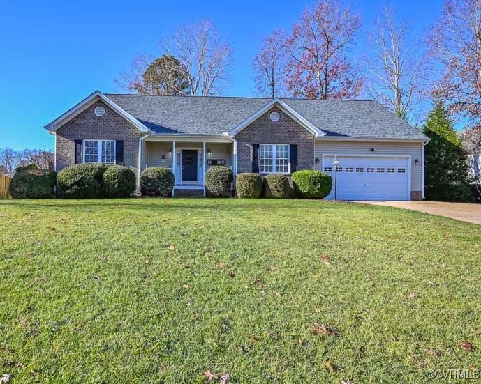 Vinyl siding, new roof, aggregate driveway, whole
