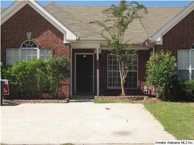 BRICK TOWNHOME WITH VINYL EAVES