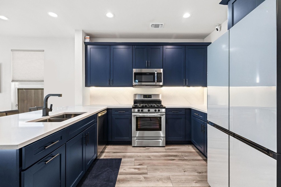 Kitchen with a sink, appliances with stainless st