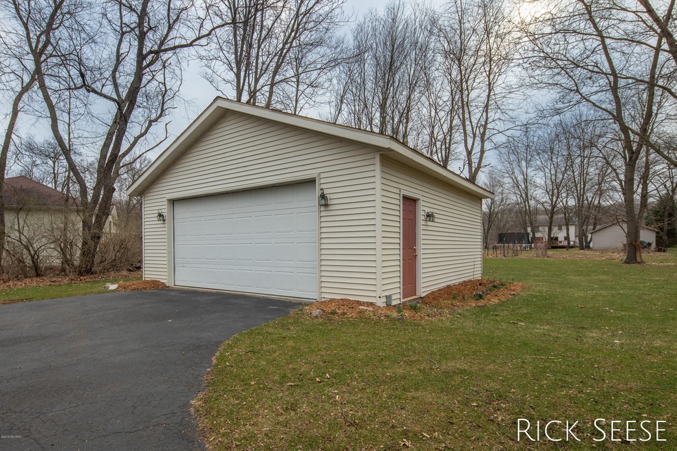 46 Rivertop Dr unit 24, Lowell, MI 49331 - photo 1