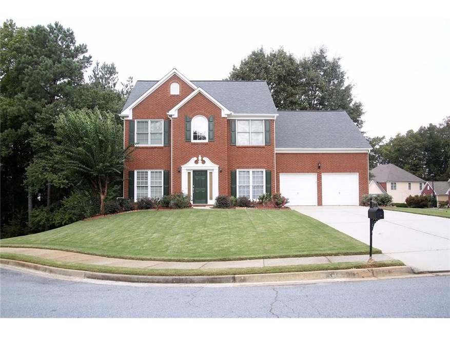 4 bedroom brick front home in swim/tennis communit