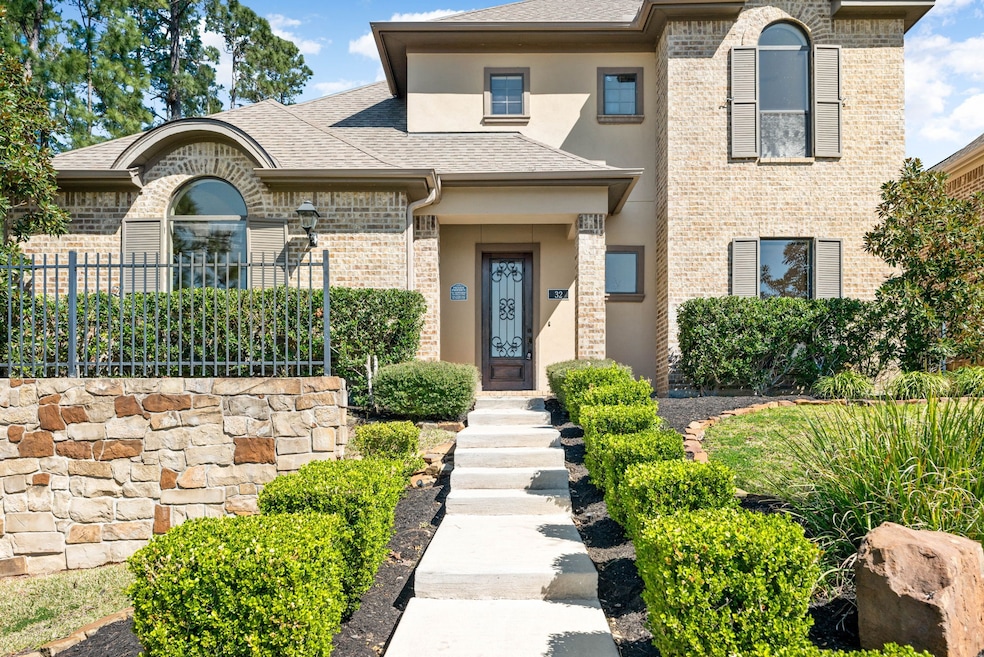 This beautiful two-story home features arched wind