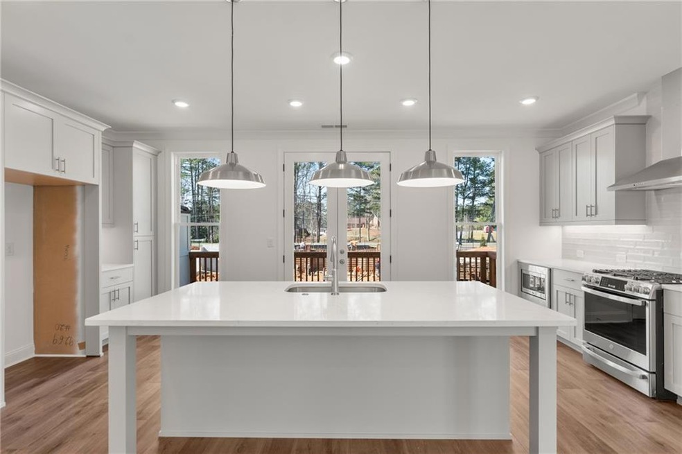 The oversized island provides space for casual din