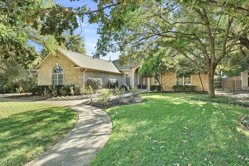 View of front of property featuring brick siding 
