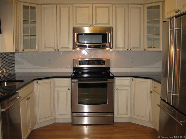 Custom Kitchen w/ Stainless Steel Appliances
