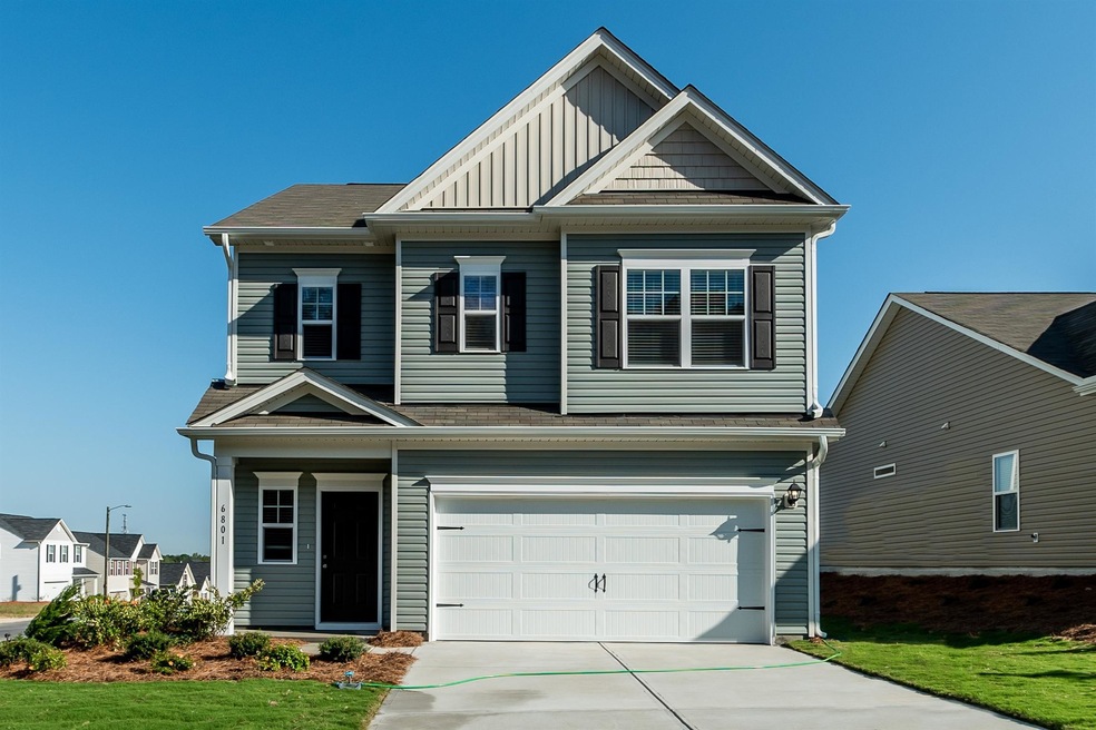 Exterior of home in a different Smith Douglas Comm