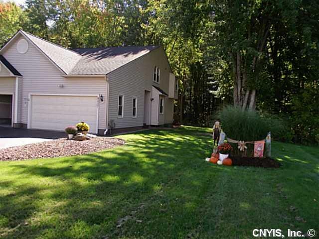 Exterior Front. Well-maintained End unit with no n