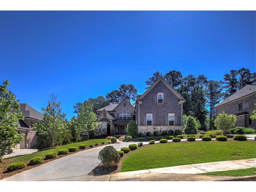 This gorgeous brick and cedar shake home is in a f