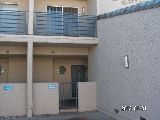 Entry patio with dedicated parking space in front