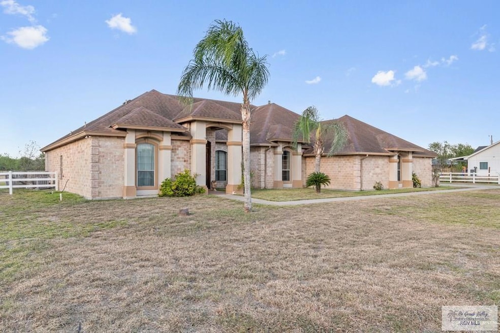 View of front of property with a front lawn