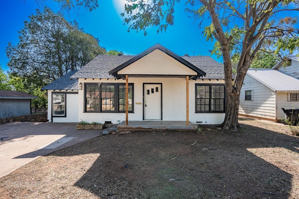 View of front of home featuring covered porch