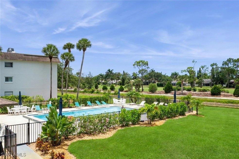 Community pool featuring a patio area