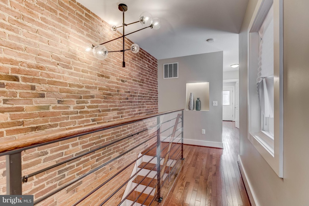 309 S Baylis St, Baltimore, MD 21224 - photo 1