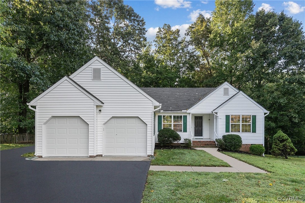 Ranch-style home featuring garage and a low mainte