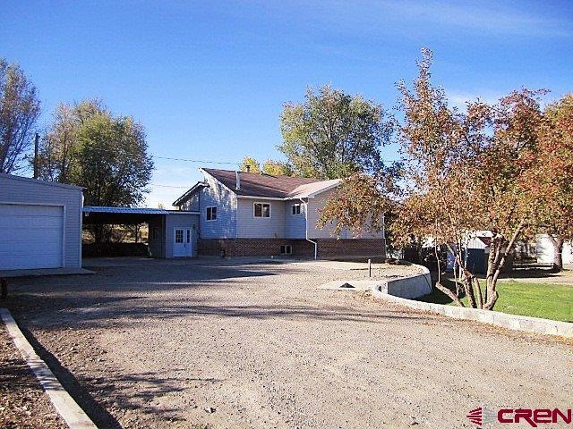 Spacious front yard set back from City Street