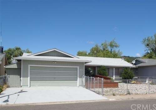 655 Bass Lane Front w/attached 2-car garage. Gated