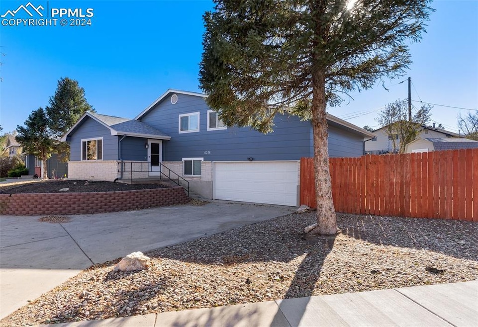 View of front of home featuring a garage