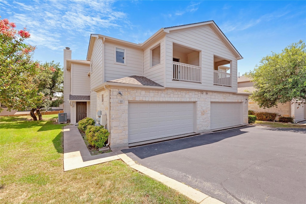 Townhome / multi-family property with a balcony, 